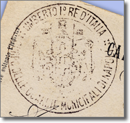 the official stamp of the Corps with the Savoia coat of arms in the middle and the writing: "UMBERTO I° RE D'ITALIA / CORPO DELLE GUARDIE MUNICIPALI DI NAPOLI" round it ("Umberto I King of Naples / Municipal Guards Corps of Naples"). 